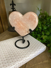 Load image into Gallery viewer, Pink Amethyst Crystal heart on black display stand
