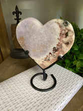 Load image into Gallery viewer, Pink Amethyst Crystal heart on black display stand