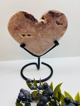 Load image into Gallery viewer, Pink Amethyst Crystal heart on black display stand