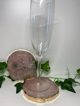 Load image into Gallery viewer, Rose Quartz slice drink coasters with gold electroplating around the edges