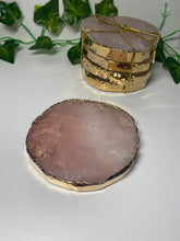 Load image into Gallery viewer, Rose Quartz slice drink coasters with gold electroplating around the edges