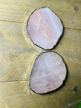 Load image into Gallery viewer, Rose Quartz slice drink coasters with silver electroplating around the edges