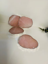 Load image into Gallery viewer, Rose Quartz slice drink coasters with silver electroplating around the edges