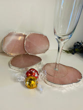 Load image into Gallery viewer, Rose Quartz slice drink coasters with silver electroplating around the edges