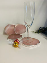 Load image into Gallery viewer, Rose Quartz slice drink coasters with silver electroplating around the edges