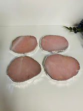 Load image into Gallery viewer, Rose Quartz slice drink coasters with silver electroplating around the edges