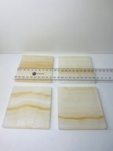 Load image into Gallery viewer, Set of 4 Natural polished Onyx Slice drink coasters