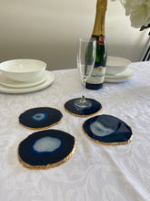 Load image into Gallery viewer, Set of 4 blue polished Agate Slice drink coasters with Gold Electroplating around the edges