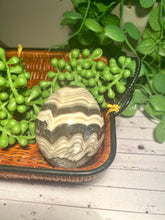 Load image into Gallery viewer, Zebra Calcite egg - office decor or unique home display piece