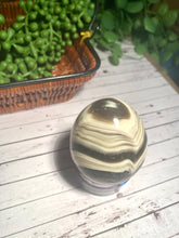 Load image into Gallery viewer, Zebra Calcite egg - office decor or unique home display piece