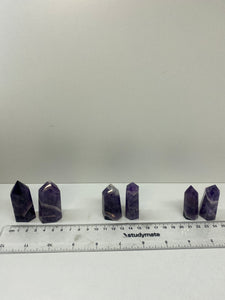 Amethyst dogtooth point towers