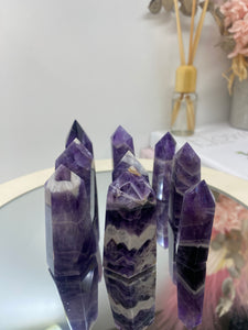 Amethyst dogtooth point towers