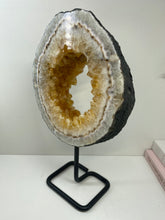 Load image into Gallery viewer, Citrine geode slice on black stand