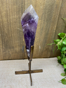 Phantom Amethyst point on display stand