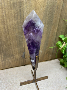 Phantom Amethyst point on display stand