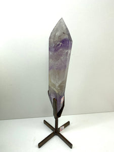 Phantom Amethyst point on display stand