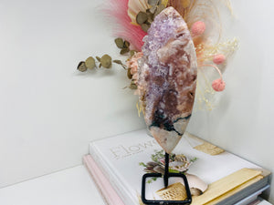 Pink Amethyst Crystal on black display stand