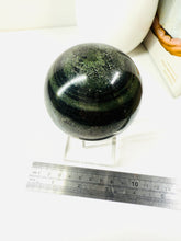 Load image into Gallery viewer, Green Hair Jasper sphere on stand