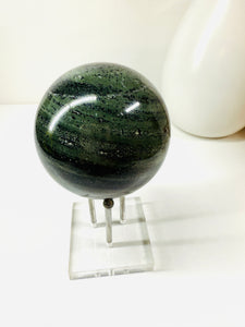 Polished Green Hair Jasper sphere on stand