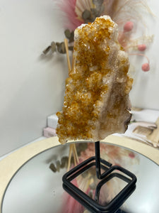 Small Citrine crystal on black stand