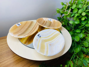 White, cream and orange Onyx oval bowls
