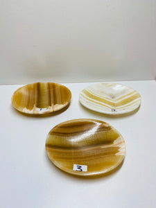 White, cream and orange Onyx oval bowls