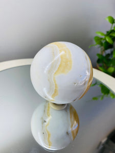 White, cream and orange Onyx sphere