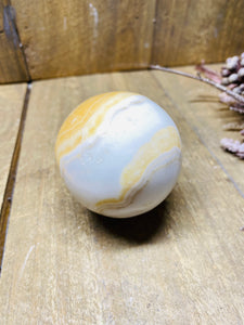 White, cream and orange Onyx sphere