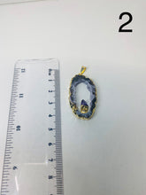 Load image into Gallery viewer, Natural Agate Geode pendant with Gold Electroplating around the edges and Amethyst point in the middle - necklace