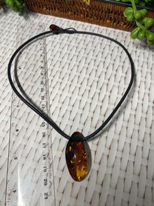 Amber necklace and pendant on leather - necklace