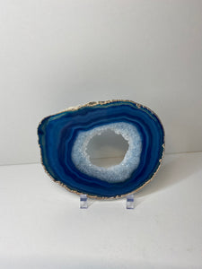 Blue polished Agate Slice drink coaster with silver electroplating around the edges 