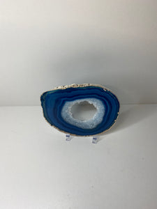 Blue polished Agate Slice drink coaster with silver electroplating around the edges 