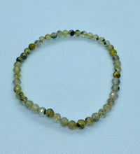 Load image into Gallery viewer, Golden Rutile in Quartz faceted bead bracelet