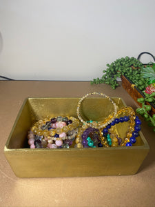 Gold trinket, jewellery or gift box with polished clear Quartz Crystal handle