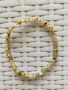 Golden Rutile in Quartz faceted bead bracelet