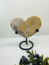 Load image into Gallery viewer, Pink Amethyst Crystal heart on black display stand