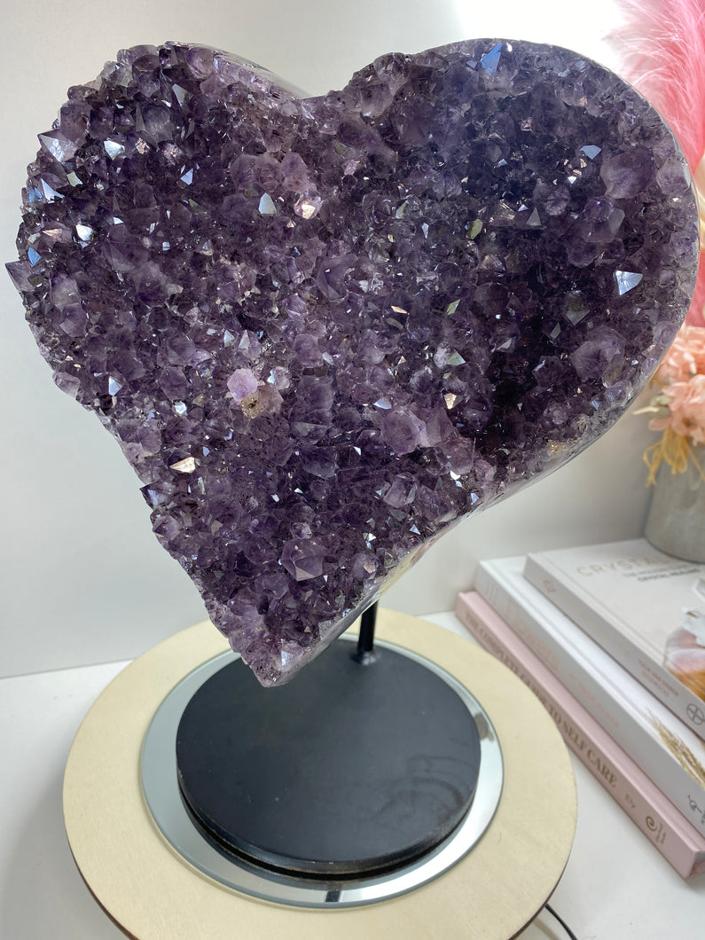 Large Amethyst love heart on black stand