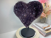 Load image into Gallery viewer, Large Amethyst love heart on black stand