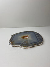 Load image into Gallery viewer, Natural polished Agate Slice drink coaster with Silver Electroplating around the edges