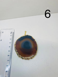 Natural polished Agate Pendant with gold electroplating around the edges - necklace