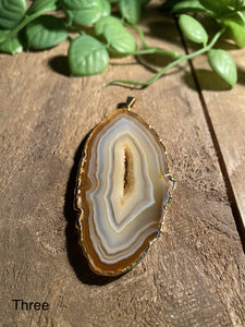 Natural polished Agate Pendant with gold electroplating around the edges - necklace