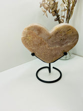 Load image into Gallery viewer, Pink Amethyst Crystal heart on black display stand