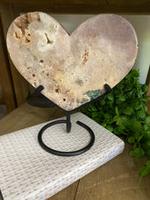 Load image into Gallery viewer, Pink Amethyst Crystal heart on black display stand