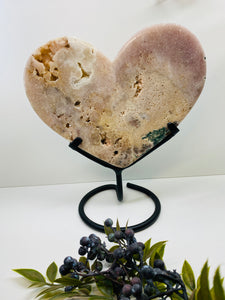 Pink Amethyst Crystal heart on black display stand