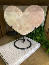 Load image into Gallery viewer, Pink Amethyst Crystal heart on black display stand