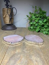 Load image into Gallery viewer, Rose Quartz slice drink coasters with silver electroplating around the edges
