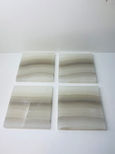 Load image into Gallery viewer, Set of 4 Natural polished Onyx Slice drink coasters